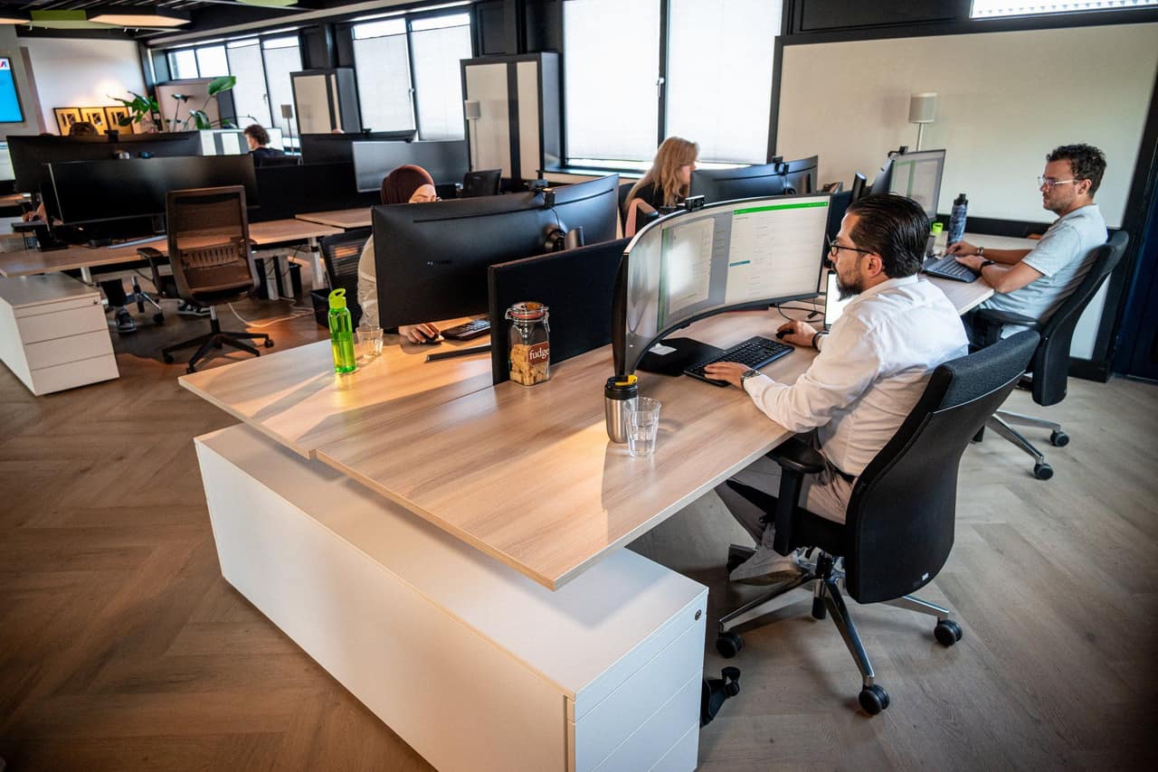 Medewerkers van iQOUNT in gesprek